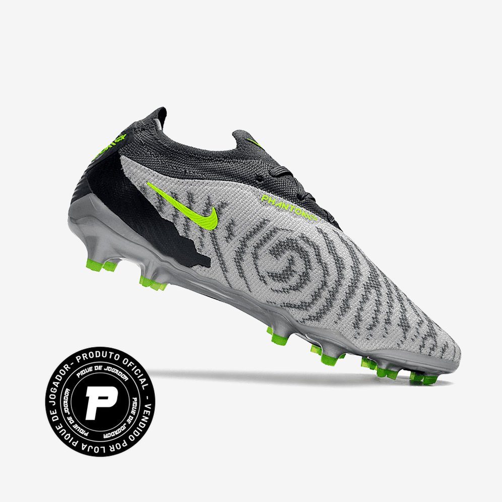 Chuteira Nike Phantom GX Elite Campo, , Arquibancada Esportes, A Chuteira Nike Phantom GX Elite Campo foi desenvolvida para jogadores que buscam o máximo em desempenho dentro dos gramados. Um modelo elite, com materiais profissionais e tecnologias que elevam seu jogo. Com estrutura leve, encaixe preciso e solado projetado para tração em alta velocidade, essa chuteira garante estabilidade e explosão nos momentos decisivos. Jogue como os melhores. Sinta a diferença nos pés. Ficha Técnica Nome: Chuteira Nike P