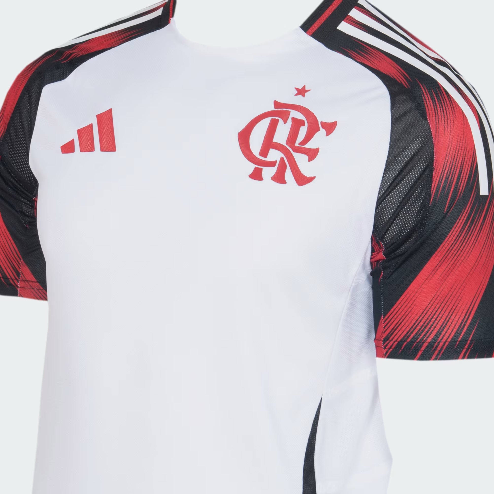 Camisa Adidas Flamengo II 25/26 Jogador Campeão Libertadores 2025, Camisa Futebol, Adidas, Inspirada no mascote do Mengão e feita com materiais reciclados Uma homenagem ao mascote do Flamengo, Urubu. Exibindo detalhes inspirados em penas nas mangas, esta camisa 2 autêntica da adidas vem em tons ousados de branco e preto. Criada para manter os jogadores rápidos, ela combina HEAT.RDY ventilado com tecido leve. O escudo do clube aplicado por calor sobre o coração permite que seu orgulho pelo futebol voe alto. 