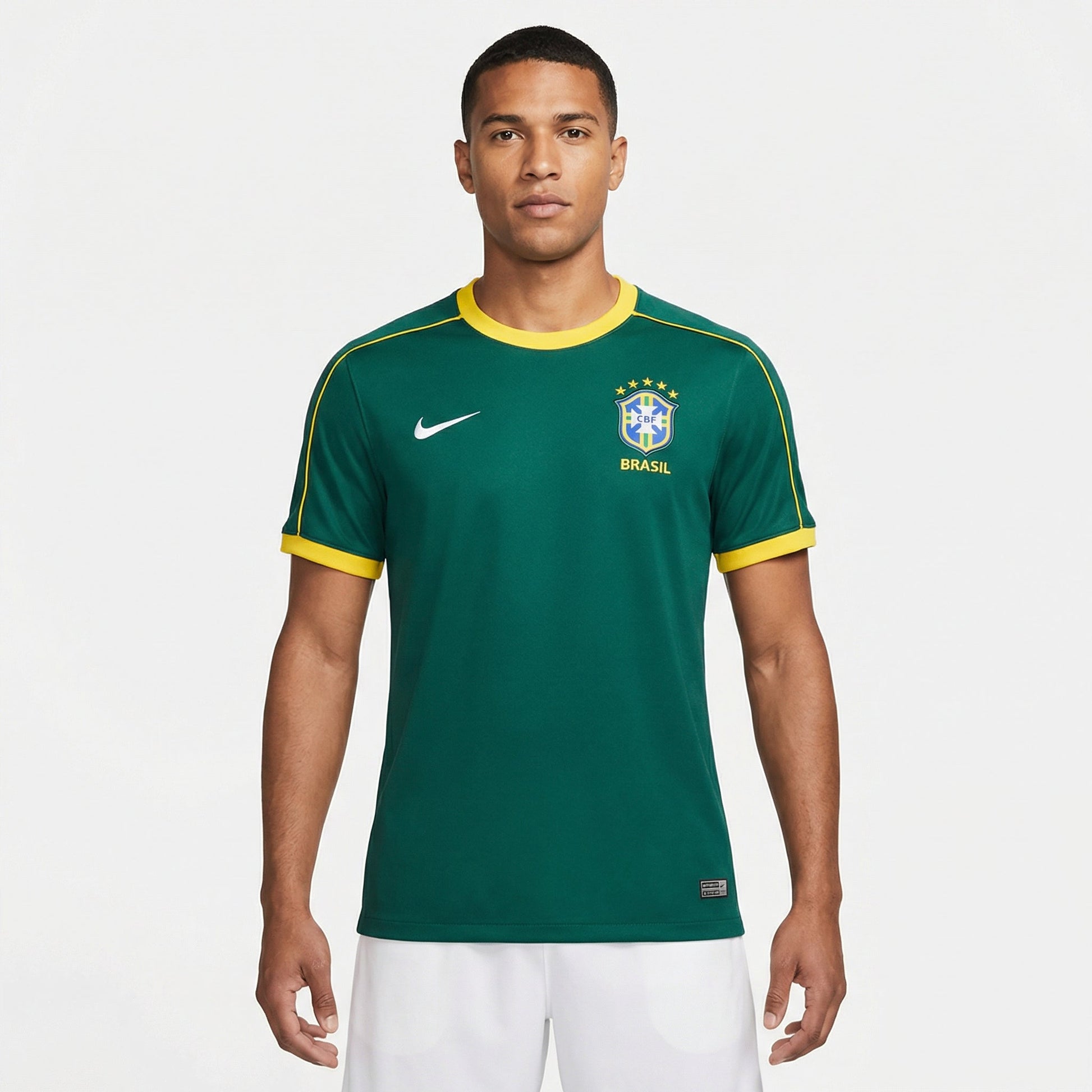 Camisa Brasil 1998 Goleiro Retrô Masculina, Kit Infantil Brasil Reserva 26/27 - Copa do Mundo, PIQUE DE JOGADOR, Reviva um dos uniformes mais marcantes da história recente da Seleção com a Camisa Brasil 1998 Goleiro Retrô Masculina. Inspirada no modelo utilizado pelos goleiros da Seleção Brasileira na Copa do Mundo de 1998, essa camisa traz de volta o estilo ousado e icônico que marcou os uniformes da época. O design apresenta cores vibrantes e padrões gráficos característicos do final dos anos 1990, reflet