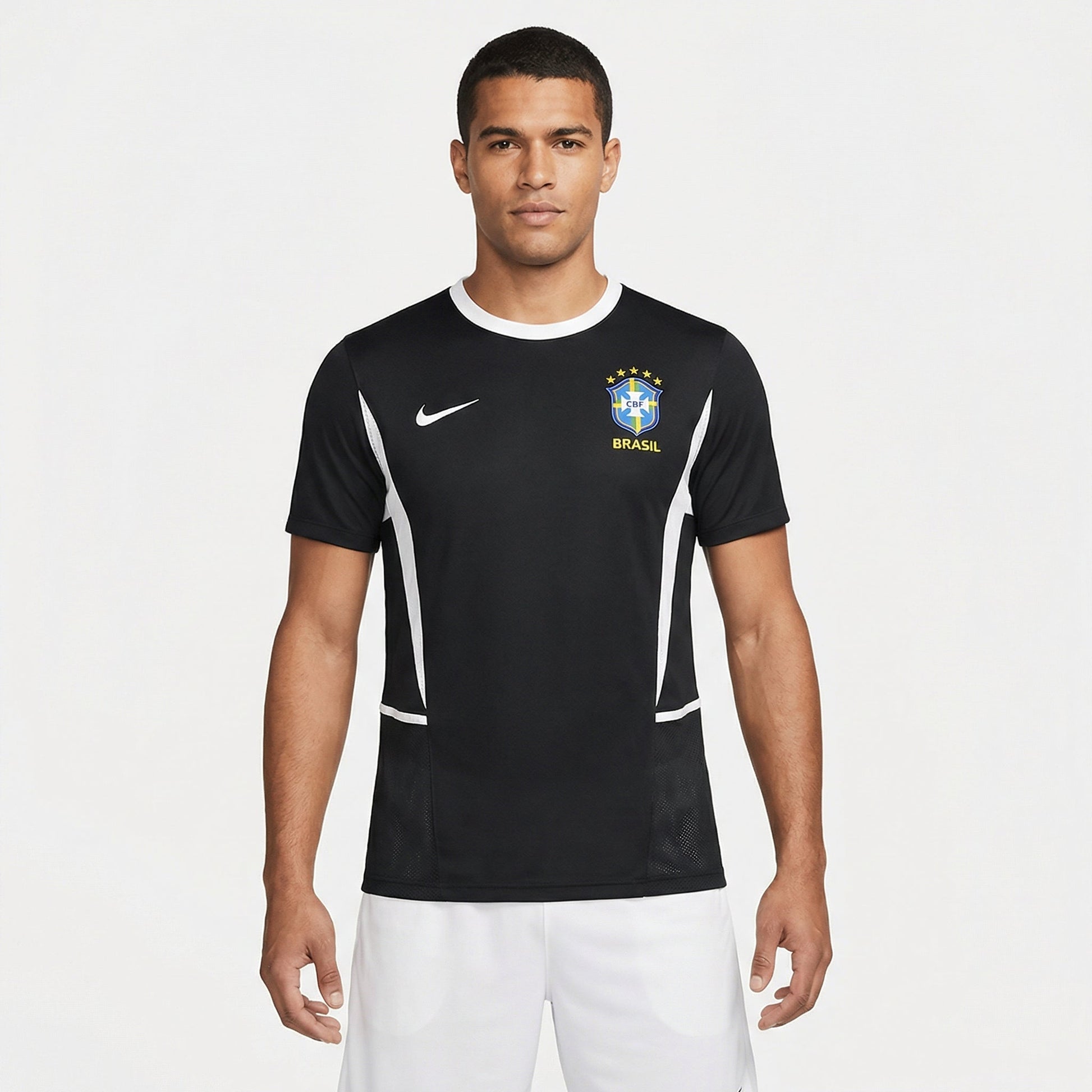 Camisa Brasil 2002 Goleiro Retrô Masculina, Kit Infantil Brasil Reserva 26/27 - Copa do Mundo, PIQUE DE JOGADOR, Reviva um modelo marcante da campanha do pentacampeonato com a Camisa Brasil 2002 Goleiro Retrô Masculina. Inspirada no uniforme utilizado pelos goleiros da Seleção Brasileira durante a Copa do Mundo de 2002, essa peça resgata um visual icônico de uma das conquistas mais importantes da história do futebol. O design apresenta cores fortes e um estilo característico dos uniformes de goleiro da époc
