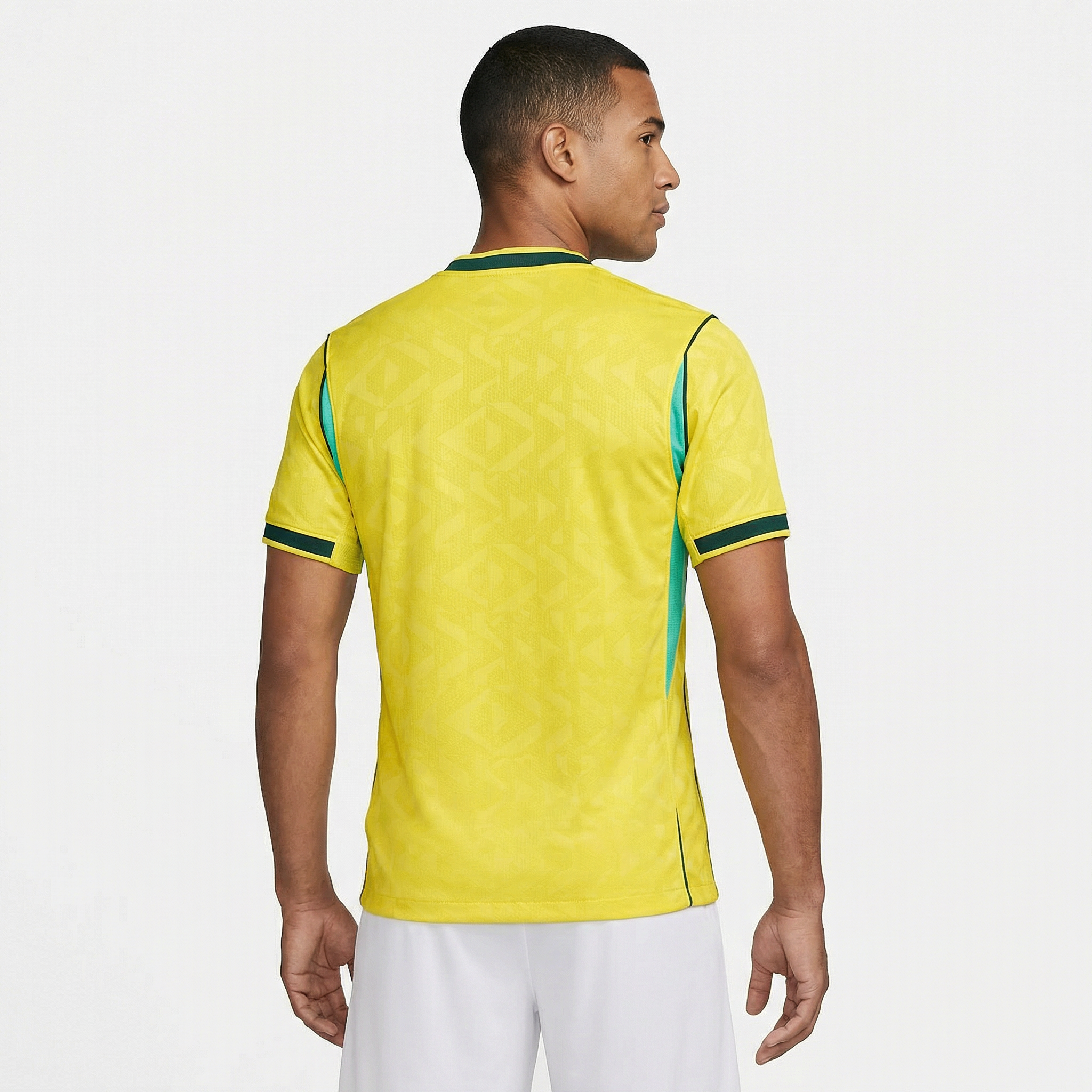 Camisa Brasil 2026/27 I Versão Jogador, Kit Infantil Brasil Reserva 26/27 - Copa do Mundo, PIQUE DE JOGADOR, A Camisa Brasil 2026/27 I Versão Jogador foi desenvolvida para reproduzir o mesmo padrão utilizado pelos atletas da Seleção Brasileira dentro de campo. Inspirada no uniforme principal da temporada 2026/27, essa camisa combina design moderno, tecnologia esportiva e a tradição que marcou a história do futebol brasileiro. O modelo apresenta o clássico visual amarelo com detalhes em verde, cores que repr