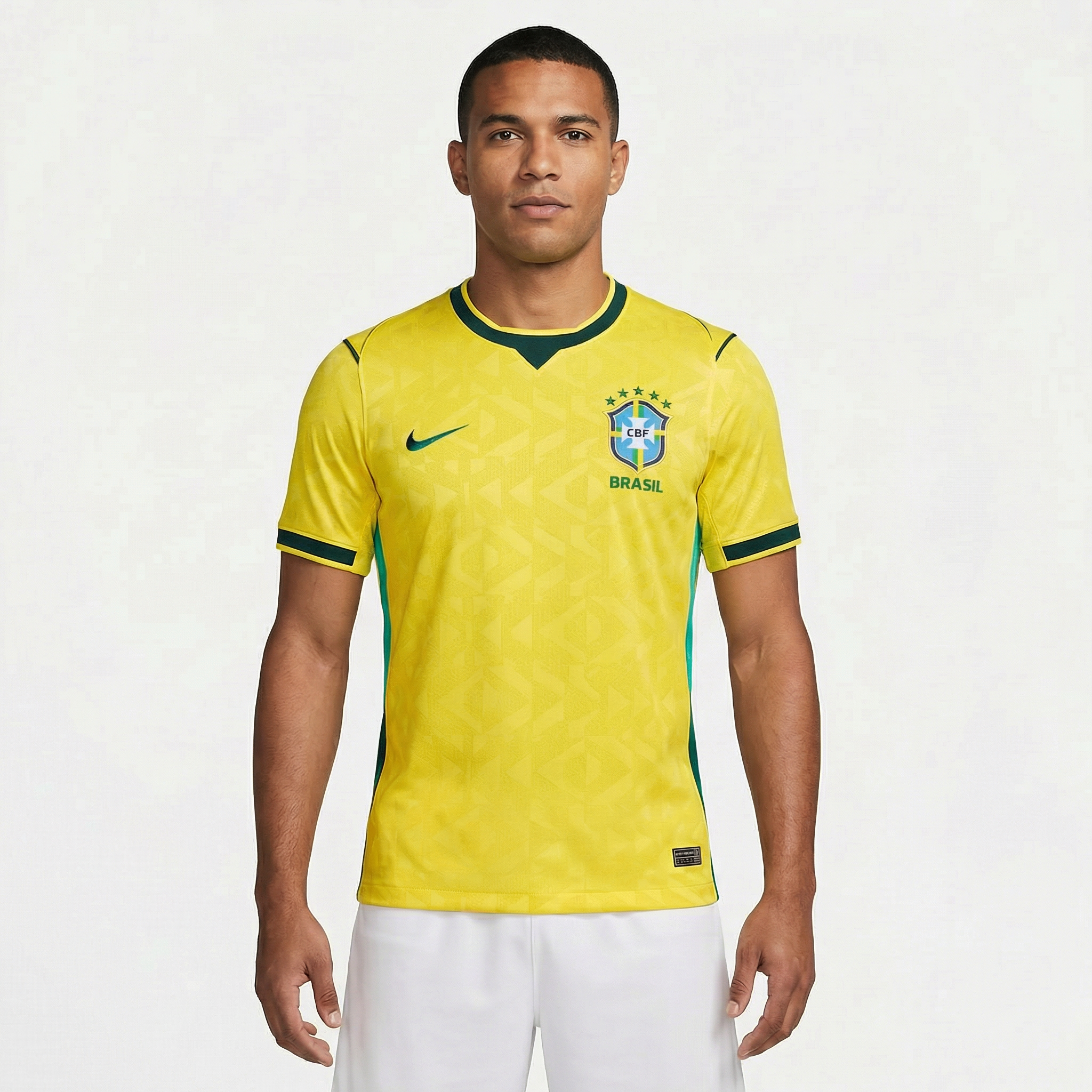 Camisa Brasil 2026/27 I Versão Jogador, Kit Infantil Brasil Reserva 26/27 - Copa do Mundo, PIQUE DE JOGADOR, A Camisa Brasil 2026/27 I Versão Jogador foi desenvolvida para reproduzir o mesmo padrão utilizado pelos atletas da Seleção Brasileira dentro de campo. Inspirada no uniforme principal da temporada 2026/27, essa camisa combina design moderno, tecnologia esportiva e a tradição que marcou a história do futebol brasileiro. O modelo apresenta o clássico visual amarelo com detalhes em verde, cores que repr