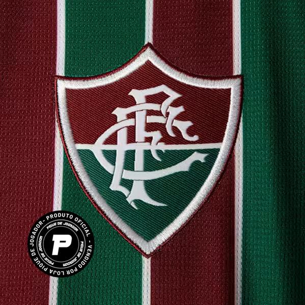 Camisa Feminina Puma Fluminense 2026/27 Home, Camisas de Futebol, PIQUE DE JOGADOR, SOBRE O PRODUTO Mais do que um uniforme, é uma camisa sagrada que protege e impulsiona jogadores e torcida, exaltando a fé inabalável da torcida. Cada detalhe carrega o sentimento tricolor, mostrando que vai além da paixão: é devoção. CARACTERÍSTICAS E BENEFÍCIOS dryCELL: Tecnologia de desempenho projetada para absorver a umidade do corpo, mantendo-o confortável e seco DETALHES Regular fit Estampa tricolor sublimada na frent