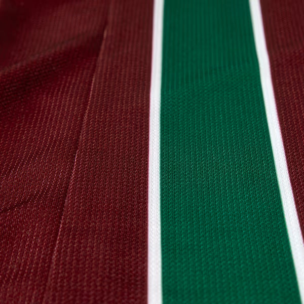 Camisa Feminina Puma Fluminense 2026/27 Home, Camisas de Futebol, PIQUE DE JOGADOR, SOBRE O PRODUTO Mais do que um uniforme, é uma camisa sagrada que protege e impulsiona jogadores e torcida, exaltando a fé inabalável da torcida. Cada detalhe carrega o sentimento tricolor, mostrando que vai além da paixão: é devoção. CARACTERÍSTICAS E BENEFÍCIOS dryCELL: Tecnologia de desempenho projetada para absorver a umidade do corpo, mantendo-o confortável e seco DETALHES Regular fit Estampa tricolor sublimada na frent