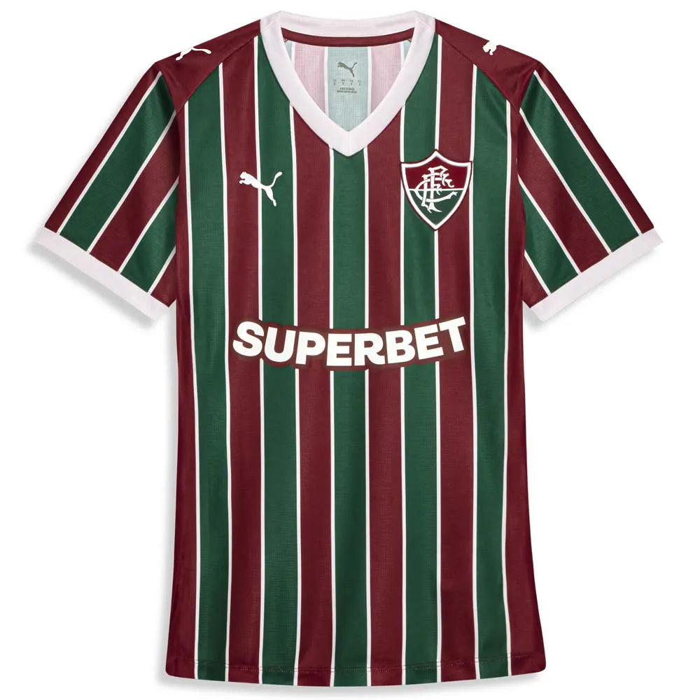 Camisa Feminina Puma Fluminense 2026/27 Home, Camisas de Futebol, PIQUE DE JOGADOR, SOBRE O PRODUTO Mais do que um uniforme, é uma camisa sagrada que protege e impulsiona jogadores e torcida, exaltando a fé inabalável da torcida. Cada detalhe carrega o sentimento tricolor, mostrando que vai além da paixão: é devoção. CARACTERÍSTICAS E BENEFÍCIOS dryCELL: Tecnologia de desempenho projetada para absorver a umidade do corpo, mantendo-o confortável e seco DETALHES Regular fit Estampa tricolor sublimada na frent
