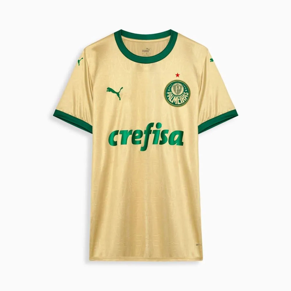 Camisa Feminina Puma Palmeiras 2024/25 III, Camisas de Futebol, PIQUE DE JOGADOR, A terceira camisa do Palmeiras para a temporada 2024/25 apresenta um design inédito na cor dourada, uma homenagem às grandes conquistas do clube. Desenvolvida pela Puma, oferece conforto, tecnologia e autenticidade para a torcida feminina. Características e Benefícios Produto oficial Puma com selo holográfico de autenticidade Tecnologia dryCELL, que absorve a umidade e mantém o corpo seco Material leve e respirável, garantindo