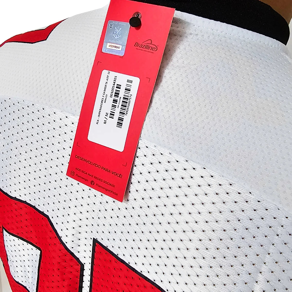 Camisa Flamengo Imperadores 87 NFL, Camisa Futebol, Braziline, Camisa Flamengo Imperadores 87 Branca - Masculino A Camisa Flamengo Imperadores Oficial é a pedida certa para os torcedores vestirem sua paixão pelo Mengão.Produzida em 100% poliéster leve e respirável, a peça conta com um design ousado e moderno em alusão ao futebol americano. Além da estampa "87", ano que o clube venceu a Copa União. Composição: 100% PoliésterIndicada para: CasualGênero: MasculinoEscudo: EstampadoOrigem: ImportadoManga: Curta-