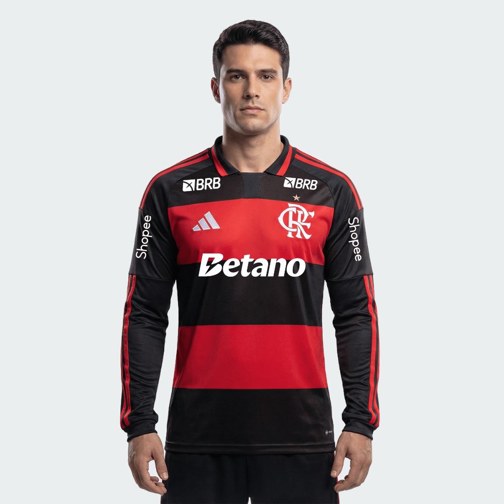 Camisa Manga Longa Adidas Flamengo 2026/27 I, Camisa Futebol, Adidas, VISTA O MANTO! Conheça a Camisa I CR Flamengo 26, uma mistura de tradição no futebol e inovação adidas. Criada para aqueles que vivem e respiram o esporte, esta é mais do que apenas uma camisa - é um símbolo de herança e paixão.Refrescante. Seca. Pronta. A tecnologia Climacool absorve e dispersa o suor para um desempenho sem distrações, permitindo que você se concentre no jogo. Adornada com o escudo costurado do clube, esta camisa é um te