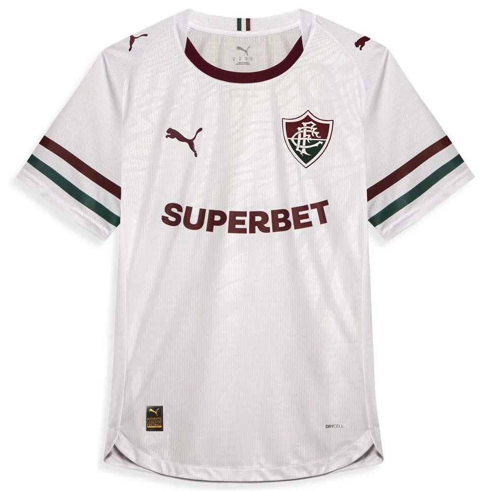 Camisa Puma Fluminense 2026/27 Away Torcedor, Camisas de Futebol, PIQUE DE JOGADOR, SOBRE O PRODUTO Mais do que um uniforme, é uma camisa sagrada que protege e impulsiona jogadores e torcida, exaltando a fé inabalável da torcida. Cada detalhe carrega o sentimento tricolor, mostrando que vai além da paixão: é devoção. CARACTERÍSTICAS E BENEFÍCIOS dryCELL: Tecnologia de desempenho projetada para absorver a umidade do corpo, mantendo-o confortável e seco DETALHES Regular fit Gola careca recortada Detalhe trico