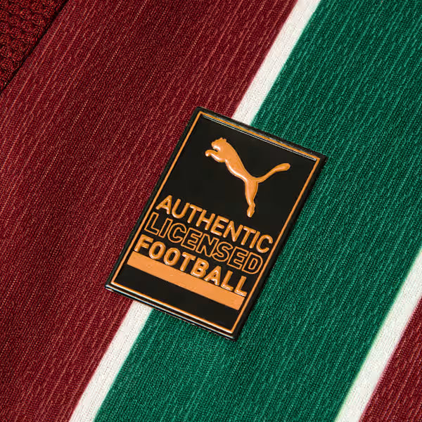 Camisa Puma Fluminense 2026/27 Home Jogador, camisa brasil, PIQUE DE JOGADOR, CARACTERÍSTICAS E BENEFÍCIOS Mesma camisa usada pelos seus ídolos, feita com combinação de tecidos tecnológicos de alta absorção e branding oficial do time. Produto com selo de autenticidade na camisa. dryCELL: Tecnologia de desempenho projetada para absorver a umidade do corpo, mantendo-o confortável e seco DETALHES Regular fit Estampa tricolor sublimada na frente, nas costas e nas mangas Gola V recortada e transpassada Manga cur
