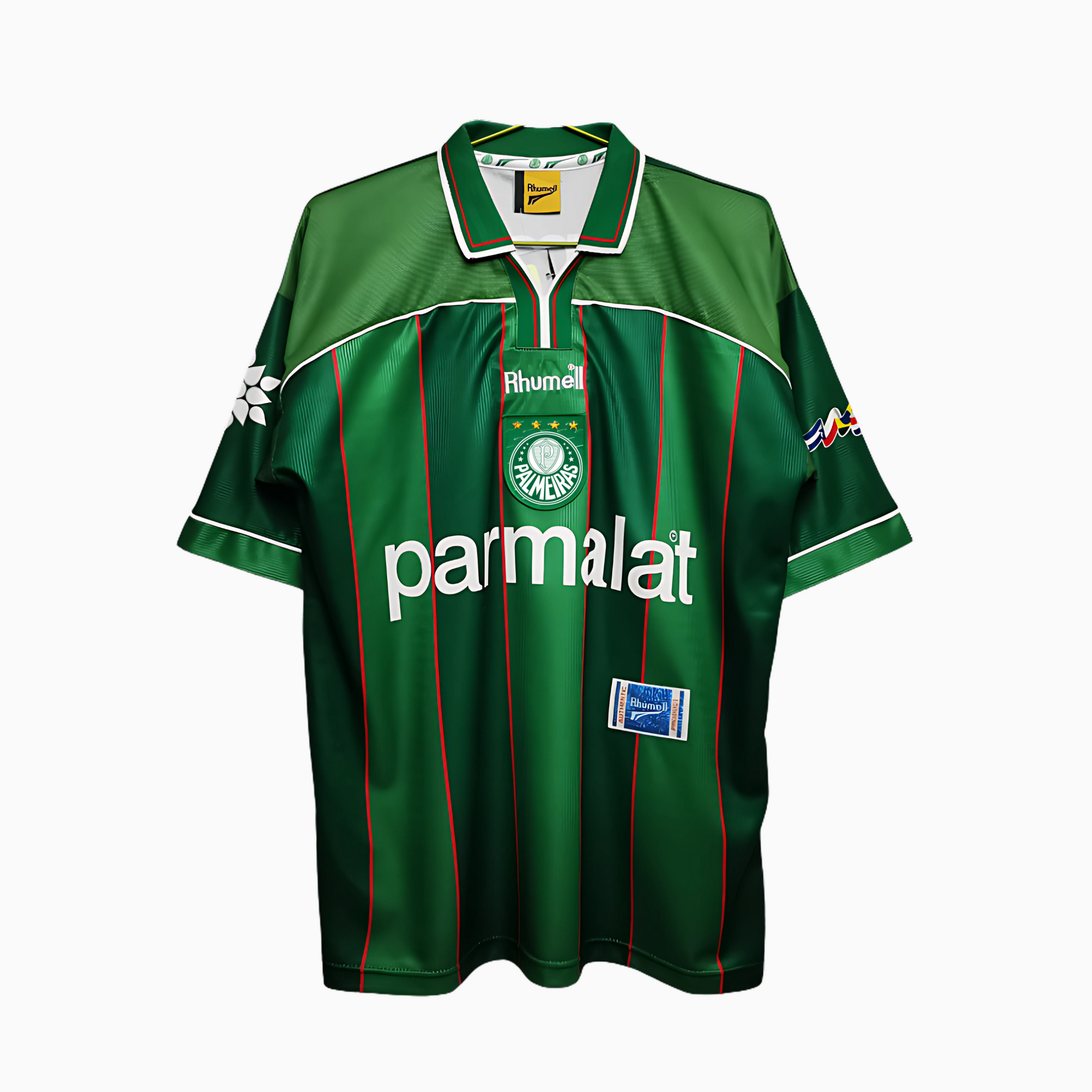 Camisa Retrô Palmeiras 1999 – Rhumell Comemorativa, Camisas de Futebol, PIQUE DE JOGADOR, A Camisa Retrô Palmeiras 1999 – Rhumell Comemorativa é uma homenagem fiel ao manto usado na maior conquista da história do Verdão: a Libertadores de 1999. Com patrocínio Parmalat, escudo bordado, gola clássica e etiqueta Rhumell original, essa peça revive uma das camisas mais icônicas do futebol brasileiro. Ideal para colecionadores e apaixonados pela história alviverde, o modelo reproduz com riqueza de detalhes o unif